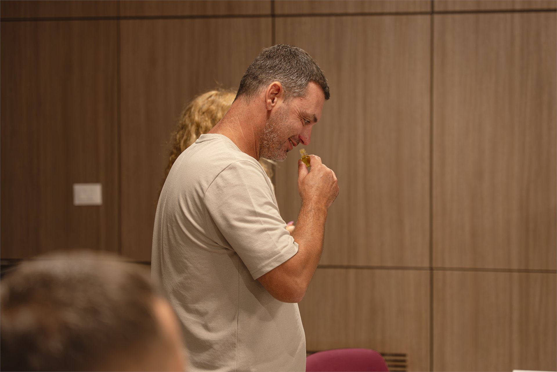 Participant smelling an aroma vial