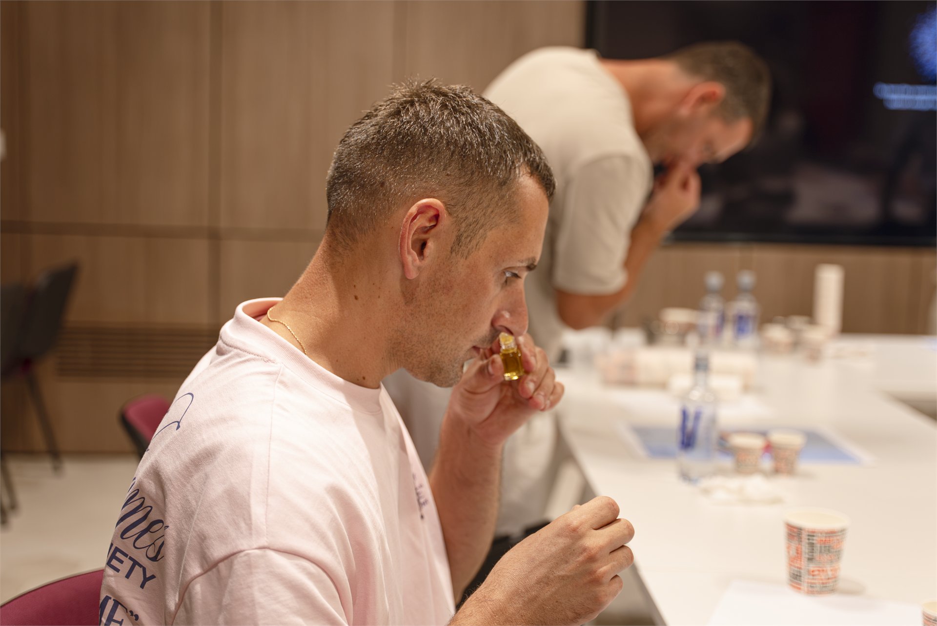 Participant evaluating coffee aroma